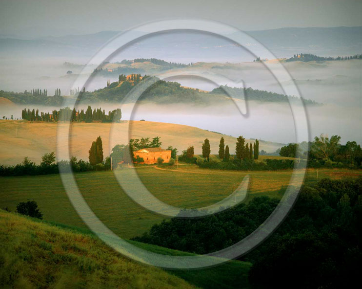 2002 - Landscapes of farm with fog on sunrise in spring, Montemori place, near Asciano village, Crete Senesi land, 18 miles south province of Siena.