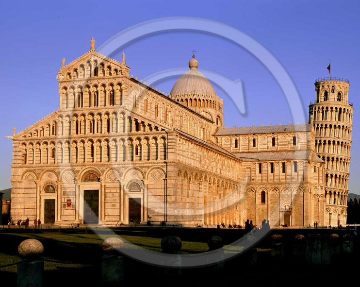 1998 - View of cathedral of Pisa town and the leaning tower in the square of Miracle on sunset.
