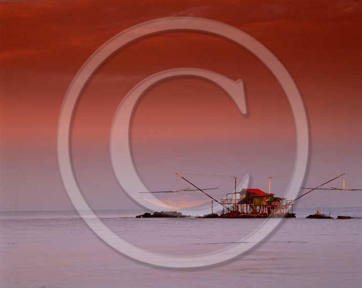 2002 - View of fisher home on sunrise in Tirreno sea, Arno river, Marina village, 6 miles east the province of Pisa.