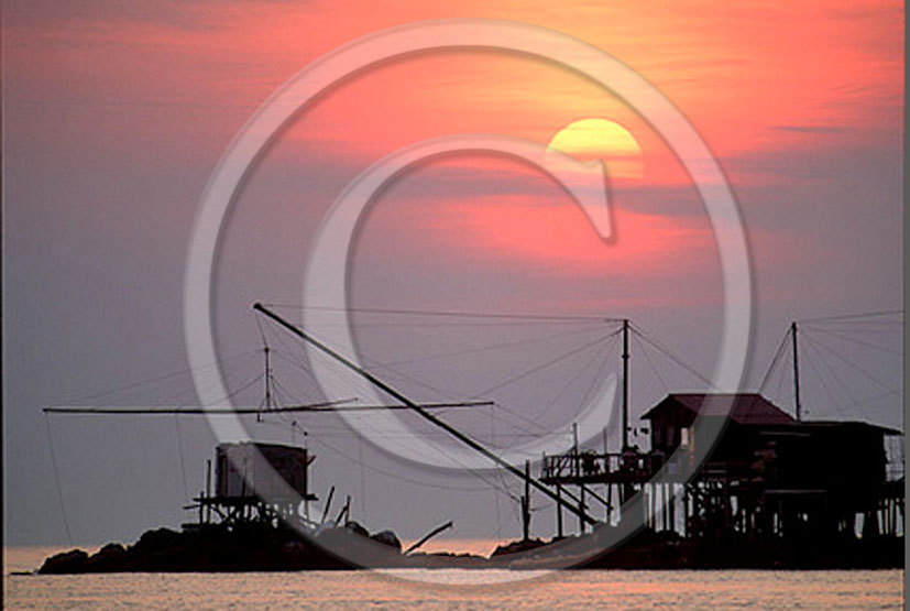 1994 - View of fisher home on sunset in Tirreno sea, Arno river, Marina village, 6 miles east the province of Pisa.