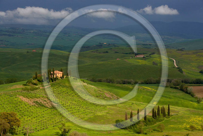 2006 - Landscapes of farm and cipress a bit before thunderstorm in spring, near Pienza village, 22 miles south province of Siena.