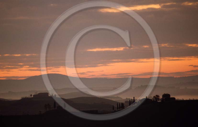 1986 - Landscapes of Crete senesi on sunset in summer, near Asciano village, Crete land, 14 miles south the province of Siena.