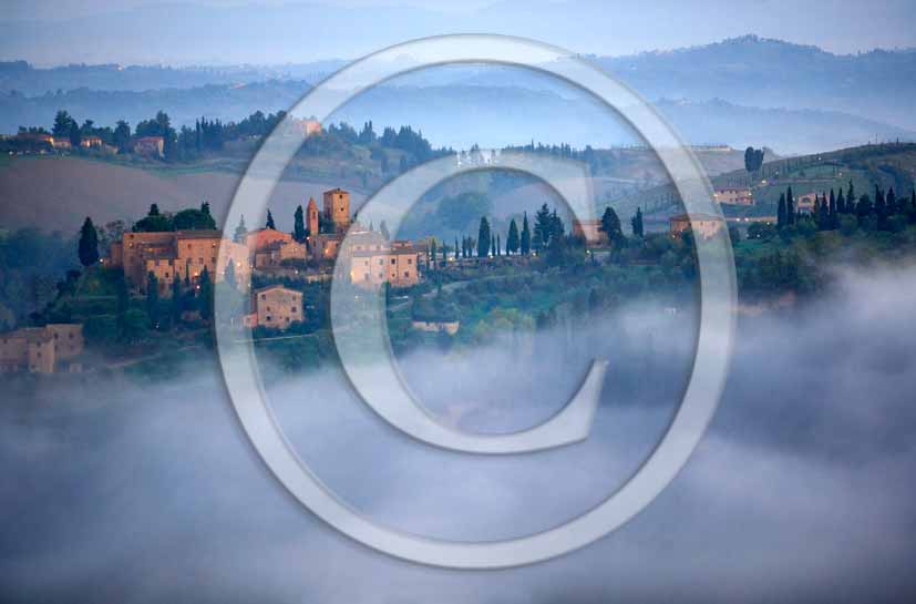 2006 - Landscapes in autumn with fog a bit before sunrise, Tonda medieval village, Era valley, near Castelfalfi place, 35 miles south est the province of Pisa. 