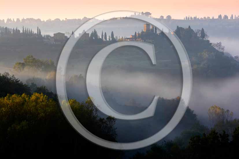 2006 - Landscapes in autumn with fog on sunrise, Tonda medieval village in background, Era valley, near Castelfalfi place, 35 miles south est the province of Pisa. 