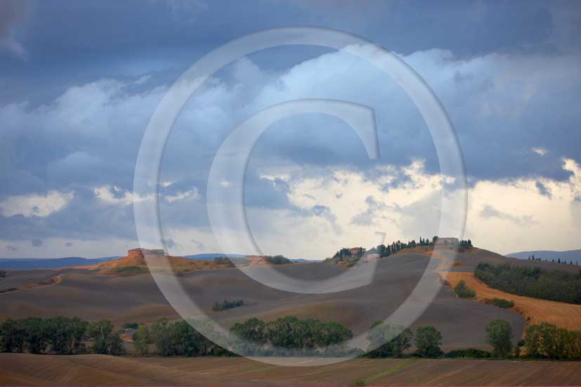 2008 - Landscapes of yellow and brown field of bead before a thunderstorm on summer in Crete senesi land, near Taverne Arbia village, 10 miles south the province of Siena.