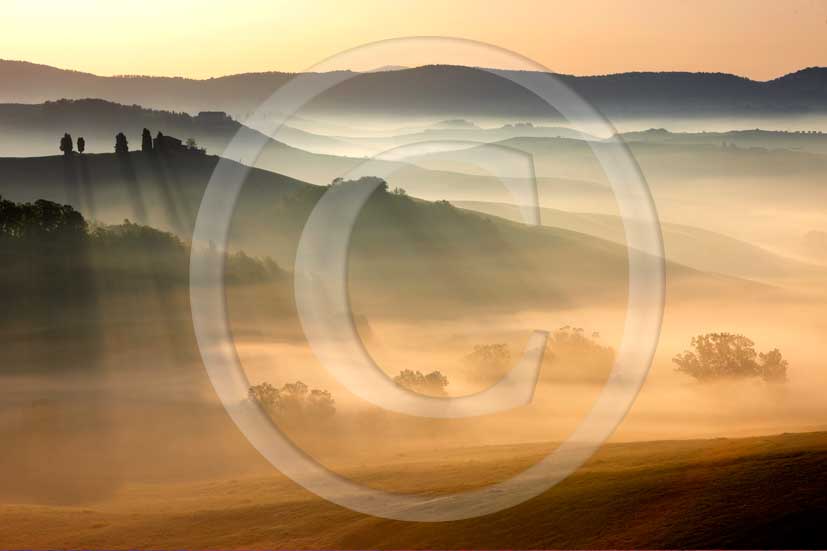 2008 - Landscapes on sunrise in early morning with fog in spring, near La Pievina place, Crete senesi land, 11 miles south the province of Siena.