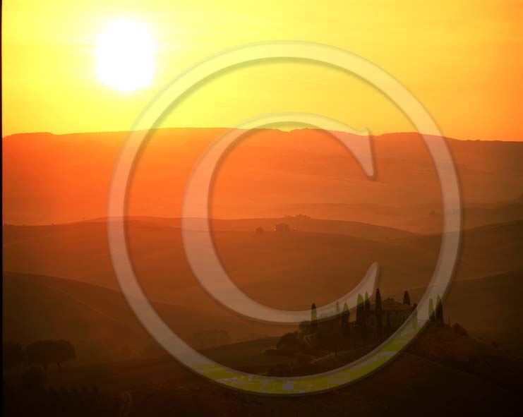 2002 - Landscapes of farm with cipress and on sunrise in summer, near S.Quirico village, Orcia valley, 20 miles south province of Siena.