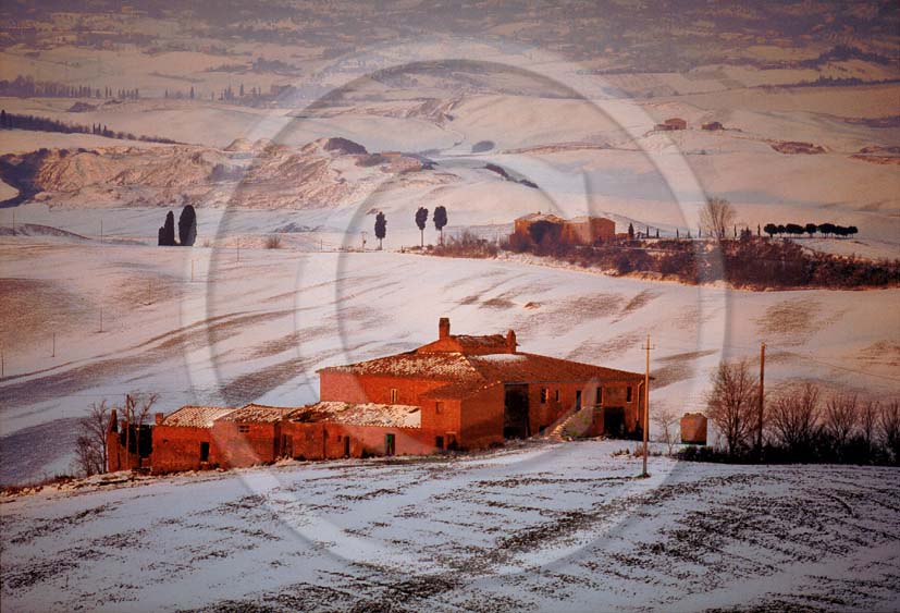 1999 - Landscapes of farm with snow on sunrise in winter, near Mucigliani place, Crete Senesi land, 13 miles south the province of Siena.