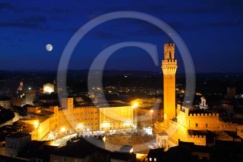 2013 - Night view with moon of Siena town and the main square Il Campo.
