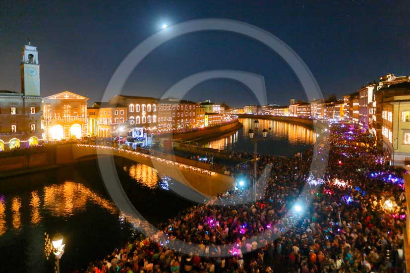 2013 - Night view of the main streets and Arno river of the city of Pisa town during the Saint Ranieri patron day.