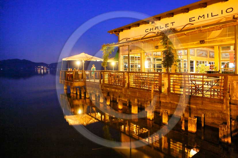 2013 - View on sunset of part of the Chalet Restaurant in Torre del Lago Puccini lake near Viareggio village.
