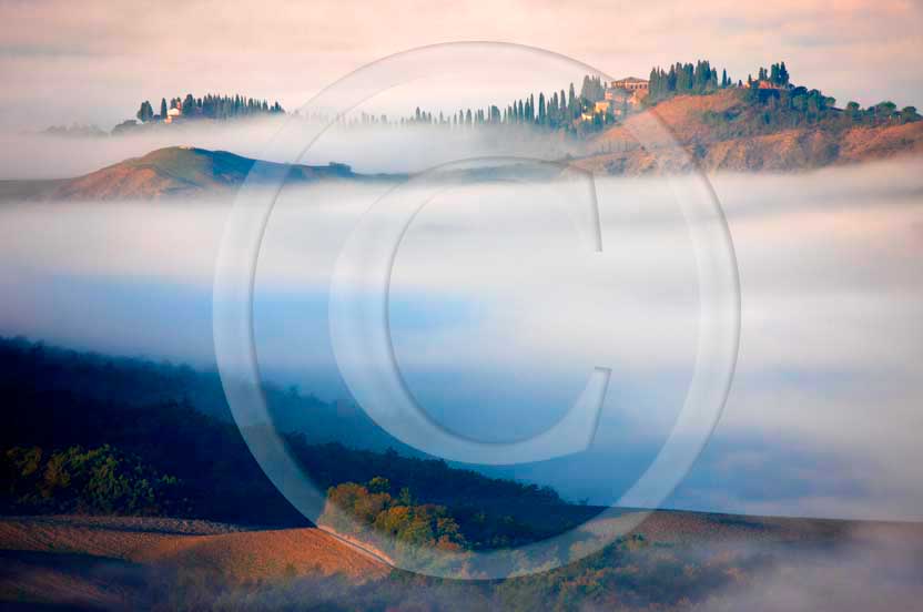 2008 - Landscapes of farm and cipress with fog on early morning at sunrise in winter, Montemori place, near Asciano village, Crete senesi
land, 20 miles south the province of Siena.  			
  			