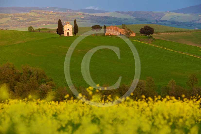 2009 - Landscapes of farm and church on sunset after a thunderstorm in spring, near Pienza village, 22 miles south province of Siena.