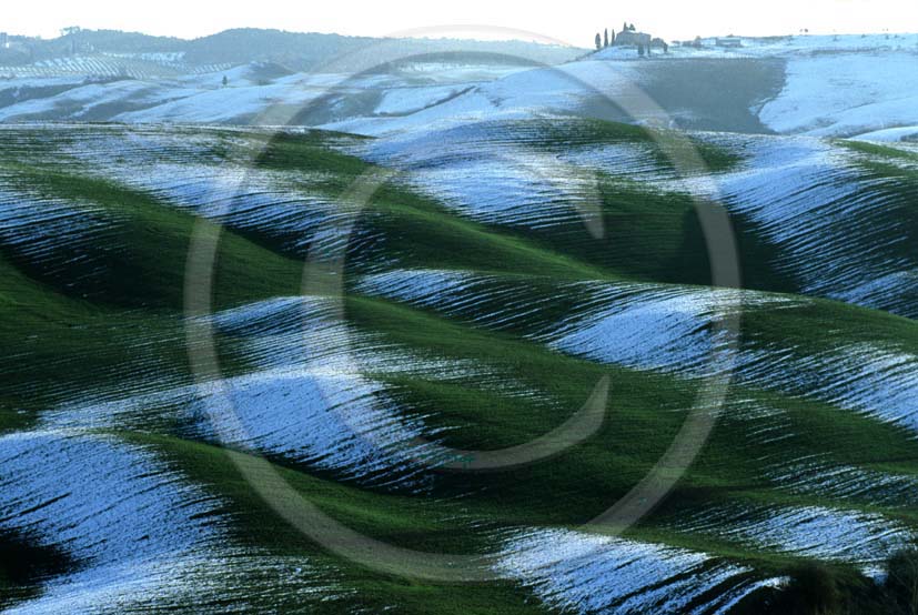   			  			1999 - Landscapes of field of bead with snow in winter on early morning, near Guistrigona place, Crete Senesi land, 21 miles south province of Siena.
  			
  			