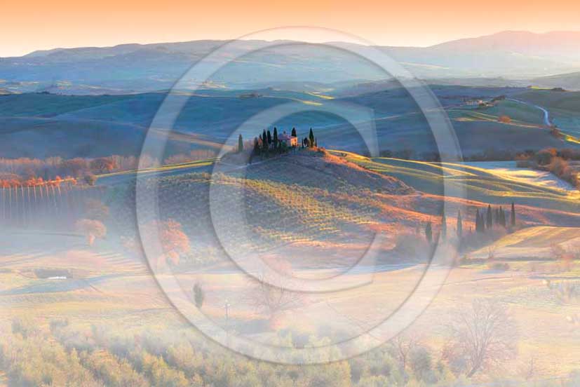 2011 - View in autumn on sunrise with fog of farm and cypress in Orcia valley near San Qurico Orcia.